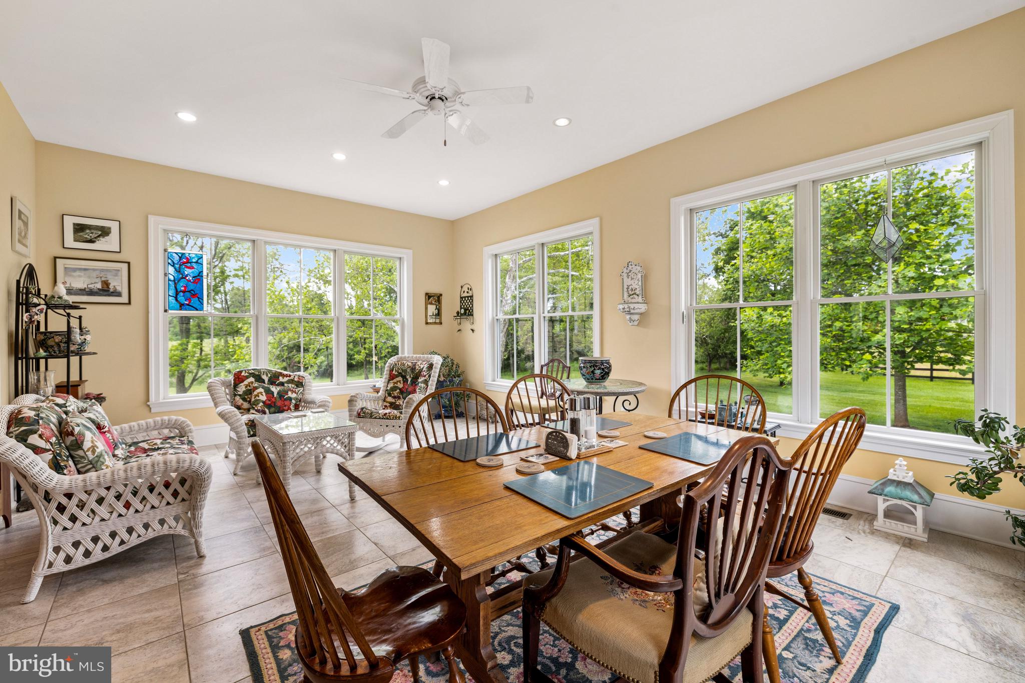20147 Woodtrail Road Round Hill, VA 20141 - Photo 9 of 41 a view of a dining room with furniture window and outside view