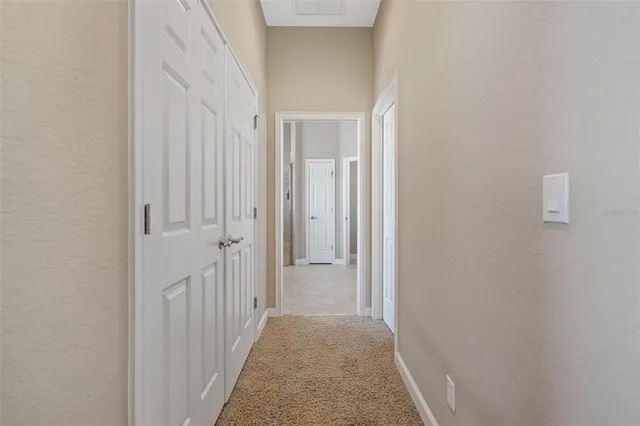 a view of a livingroom from a hallway