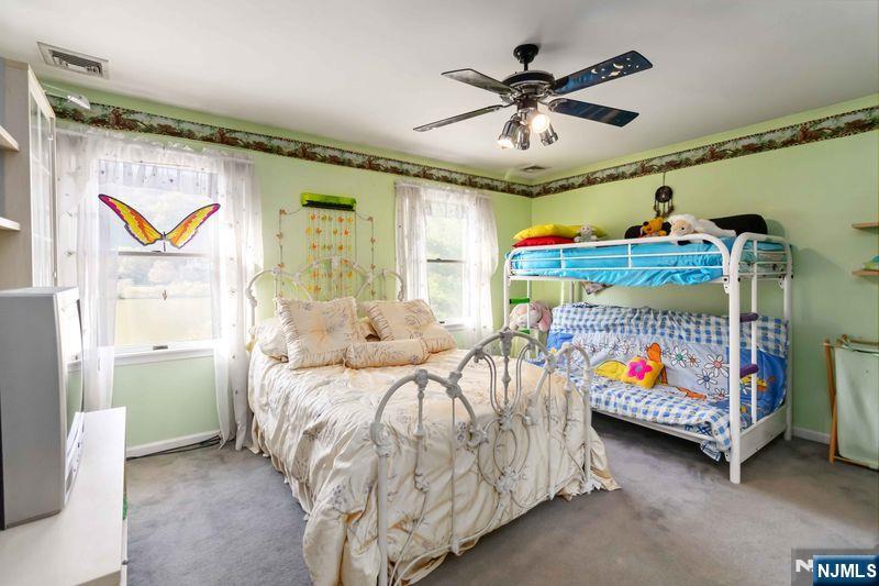 2 Upper Lake Road Oak Ridge, NJ 07438 - Photo 32 of 50 a bedroom with bed and window