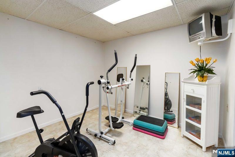 2 Upper Lake Road Oak Ridge, NJ 07438 - Photo 39 of 50 a view of gym equipment and living room view