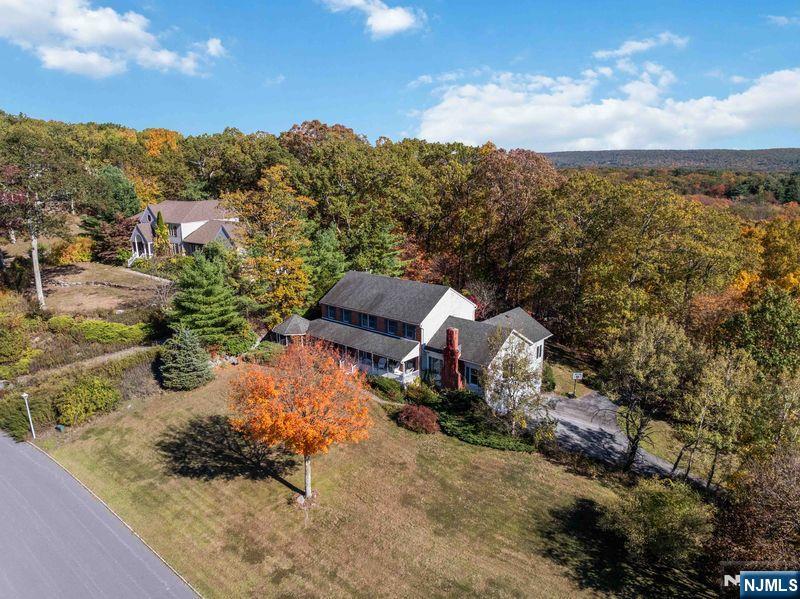 2 Upper Lake Road Oak Ridge, NJ 07438 - Photo 48 of 50 an aerial view of a house with a yard basket ball court and outdoor seating