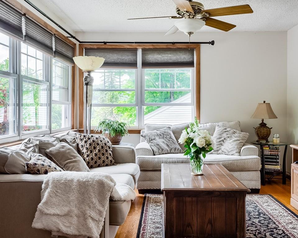 54 Manhattan Road Worcester, MA 01602 - Photo 5 of 19 a living room with furniture and a large window