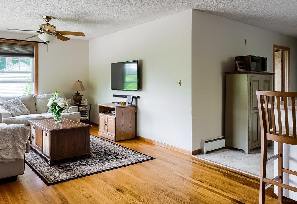 54 Manhattan Road Worcester, MA 01602 - Photo 6 of 19 a living room with furniture and a flat screen tv
