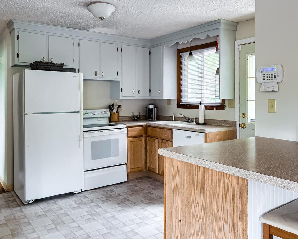 54 Manhattan Road Worcester, MA 01602 - Photo 8 of 19 a kitchen with appliances a sink and a counter