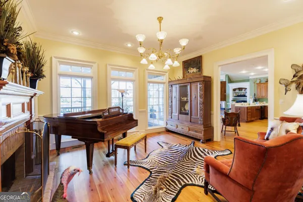 a view of a livingroom with dining table and a couch