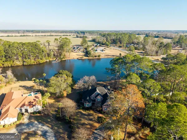 a bed room with a bed and a window