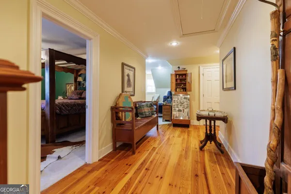 a bathroom with a double vanity sink toilet mirror vanity and shower