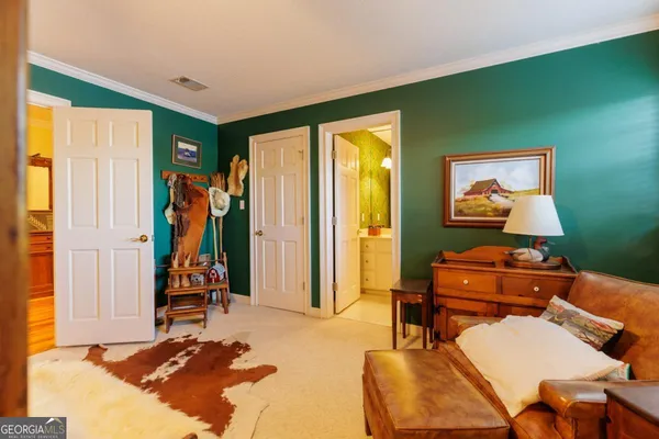 a kitchen with stainless steel appliances granite countertop a lot of cabinets and wooden floor