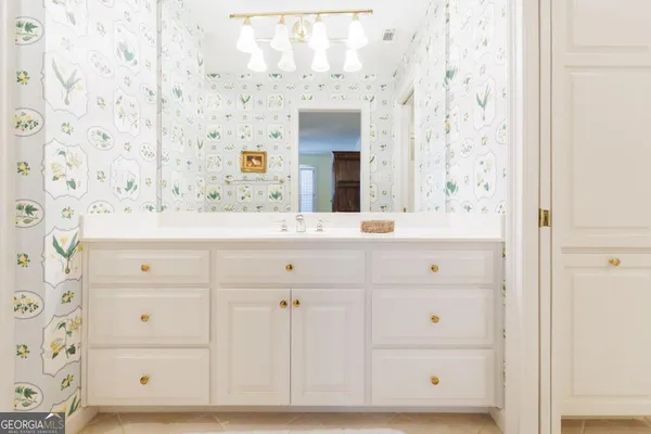 a dining room with furniture window and wooden floor