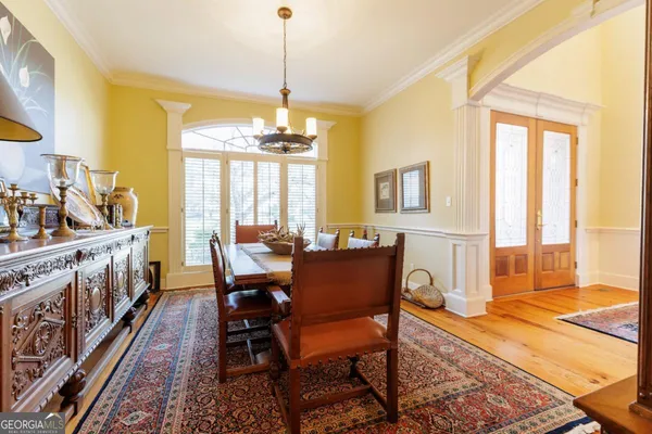 a living room with fireplace furniture and a flat screen tv