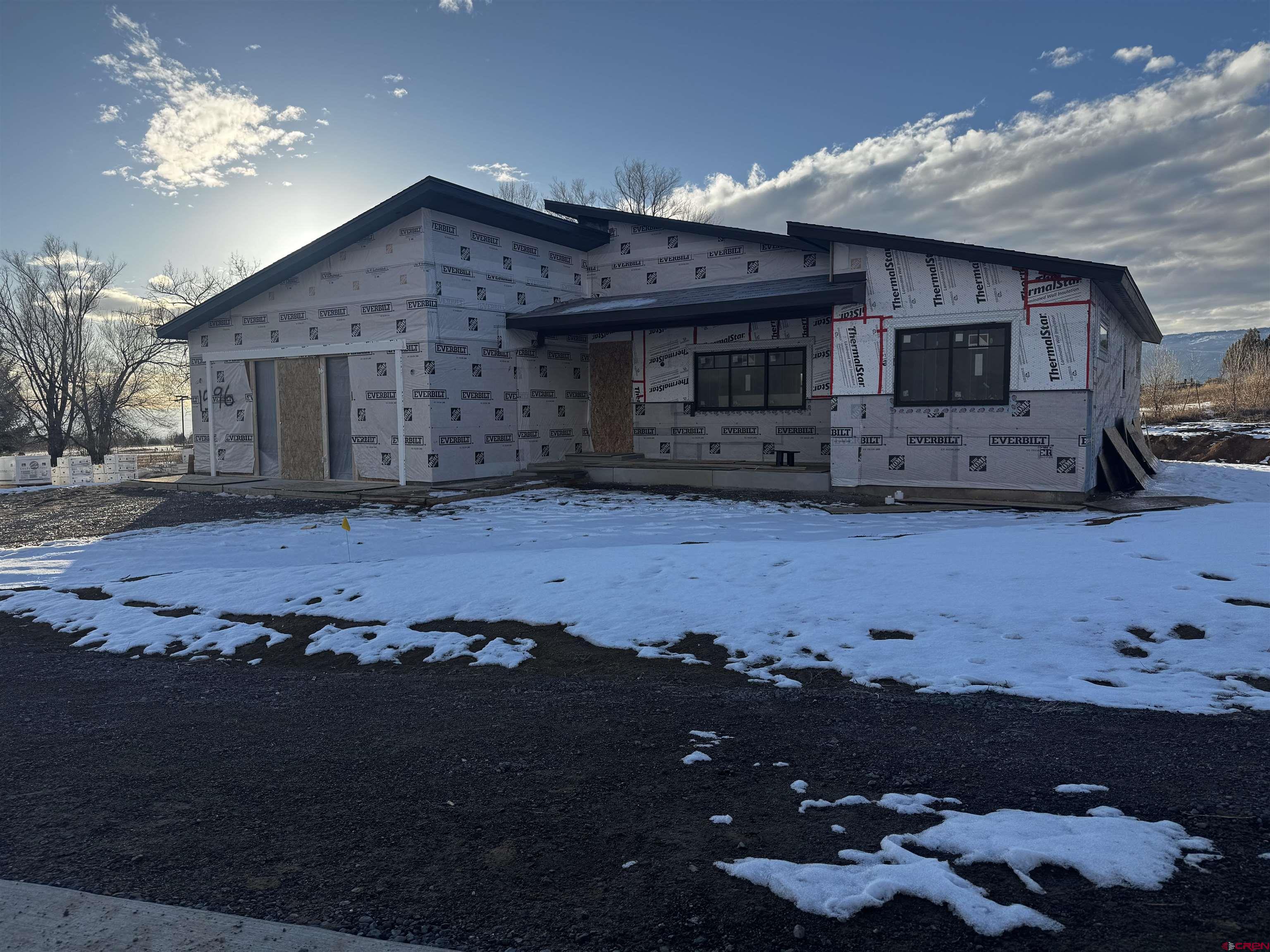 1596 Southeast 3rd Street Cedaredge, CO 81413 - Photo 2 of 2 a view of a house with a patio