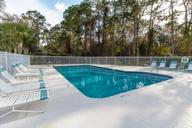 a view of swimming pool with a patio