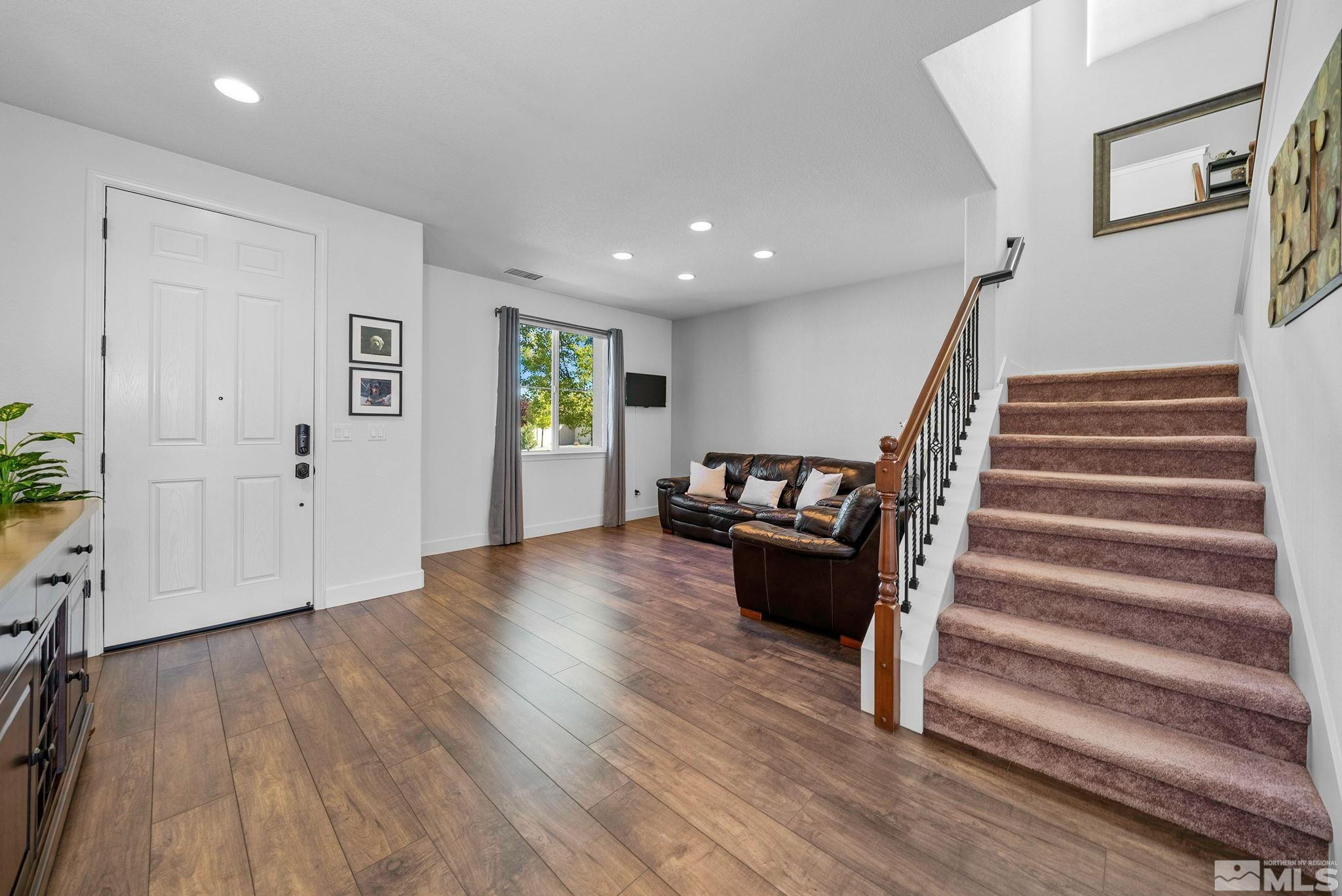 2040 Whitecliff Drive Reno, NV 89521 - Photo 8 of 35 a view of entryway with wooden floor and stairs