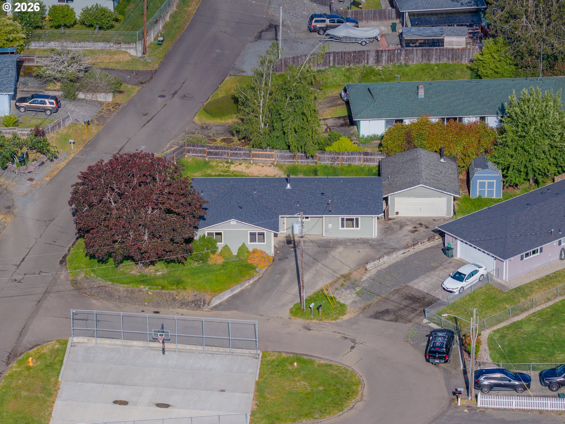 1816 Sunset Court Myrtle Point, OR 97458 - Photo 6 of 42 an aerial view of a house with a yard