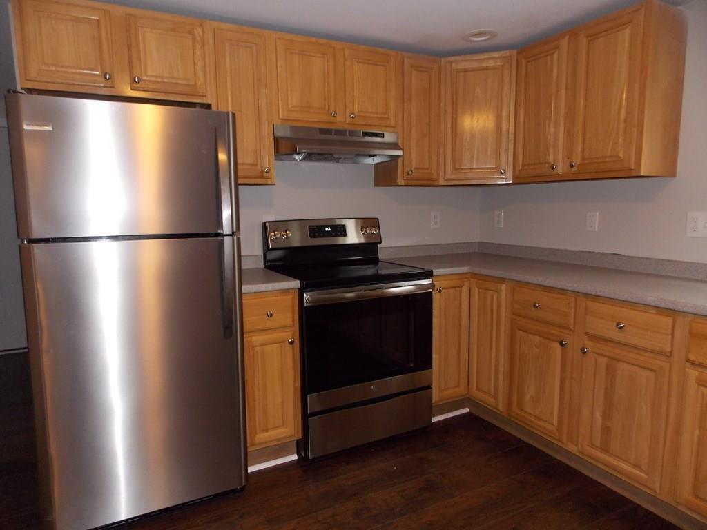 4 Austin Road Phillipston, MA 01331 - Photo 5 of 15 a white refrigerator freezer sitting in a kitchen