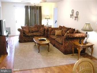 576 Kennington Road, Unit 576 Reisterstown, MD 21136 - Photo 3 of 18 Spacious Living Room with Pergo Floors