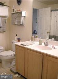 576 Kennington Road, Unit 576 Reisterstown, MD 21136 - Photo 9 of 18 Master Bath w/Maple Cabinets and Tub/Shower Combo.