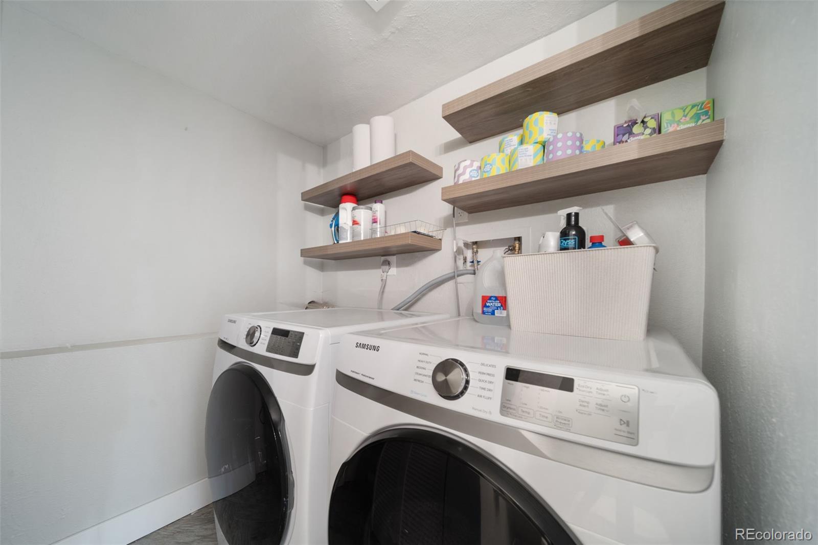 17372 East Prentice Circle Centennial, CO 80015 - Photo 12 of 41 a utility room with dryer and washer