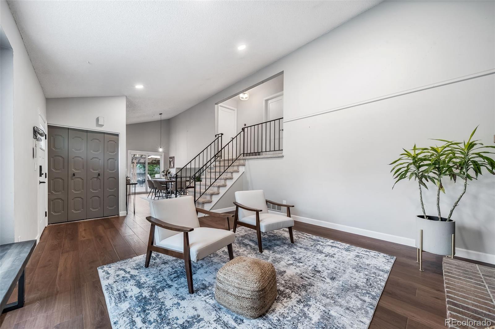 17372 East Prentice Circle Centennial, CO 80015 - Photo 18 of 41 a living room with furniture and a potted plant