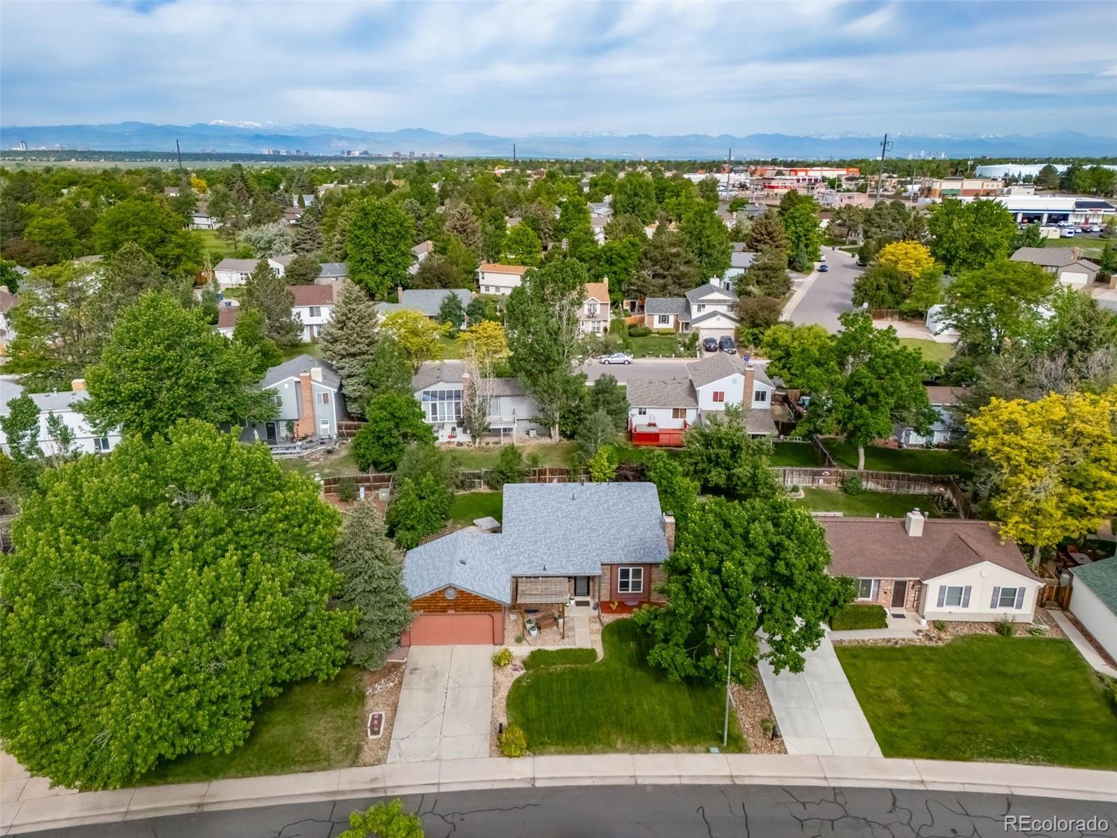 17372 East Prentice Circle Centennial, CO 80015 - Photo 2 of 41 an aerial view of residential houses with outdoor space and trees