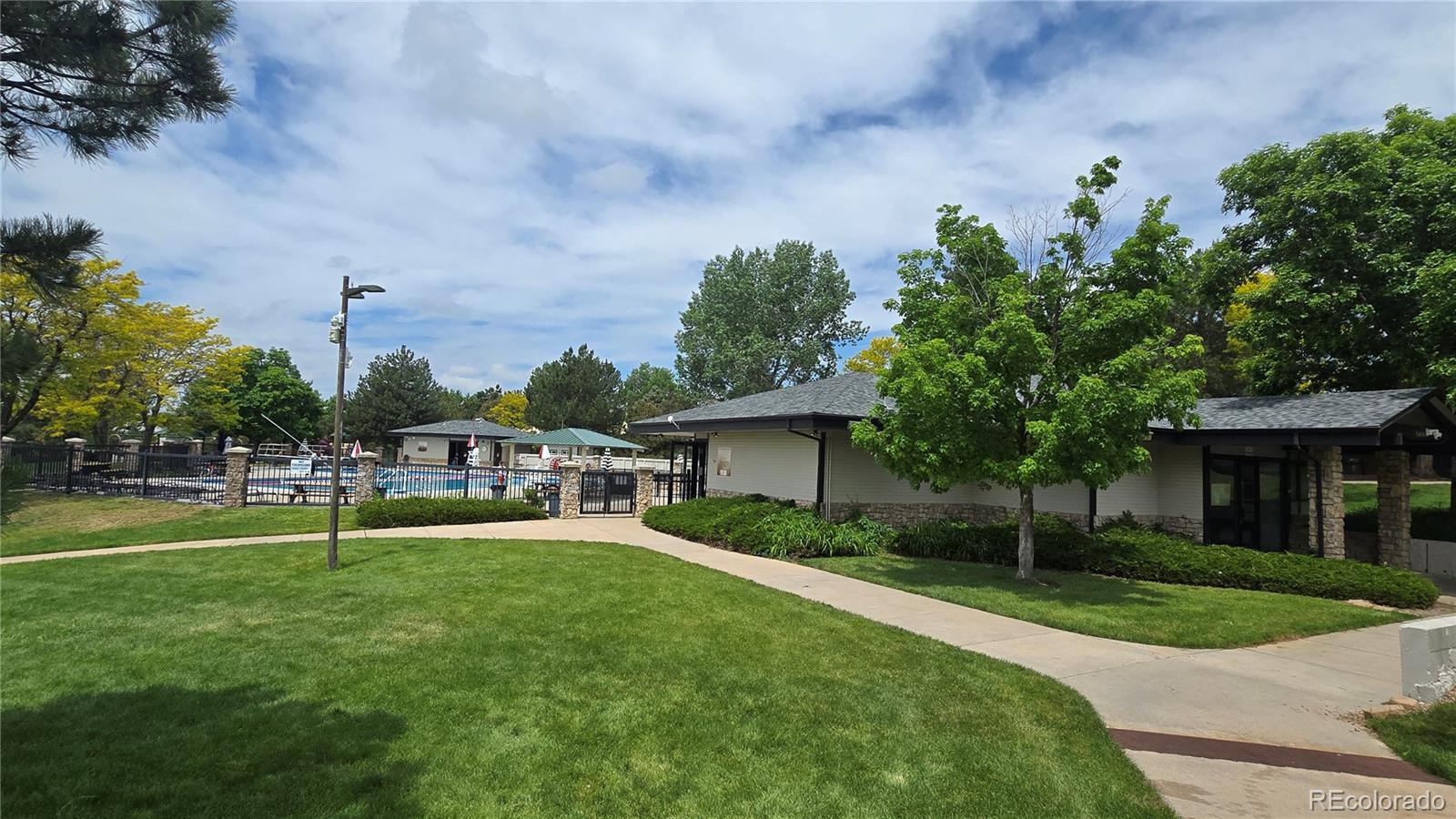 17372 East Prentice Circle Centennial, CO 80015 - Photo 27 of 41 a house view with a sitting space and garden