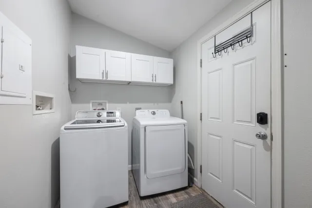 a utility room with dryer and washer
