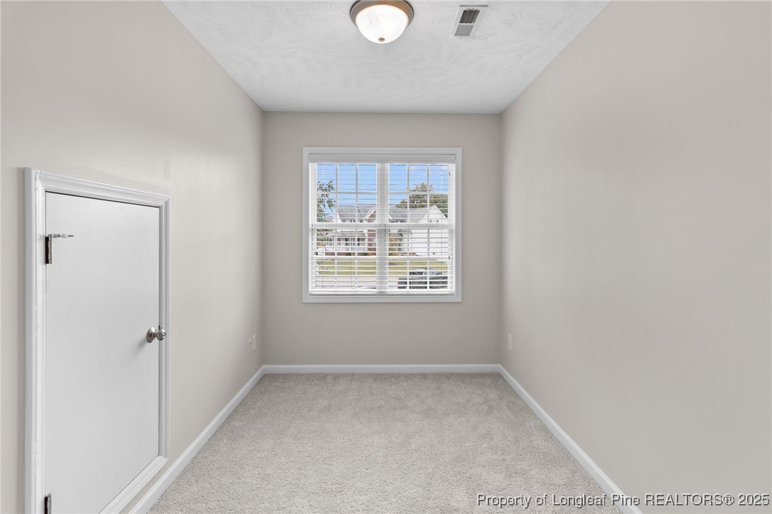 43 Ambrose Point Cameron, NC 28326 - Photo 23 of 45 an empty room with a window