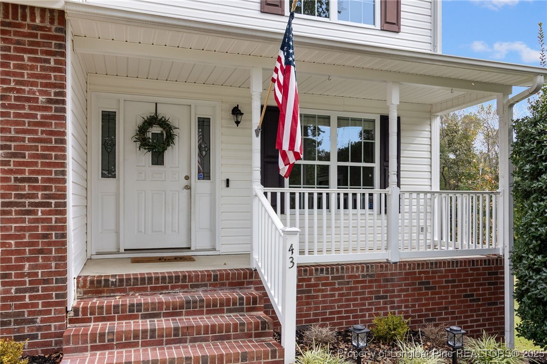 43 Ambrose Point Cameron, NC 28326 - Photo 4 of 45 a view of a house with entryway and wooden walls