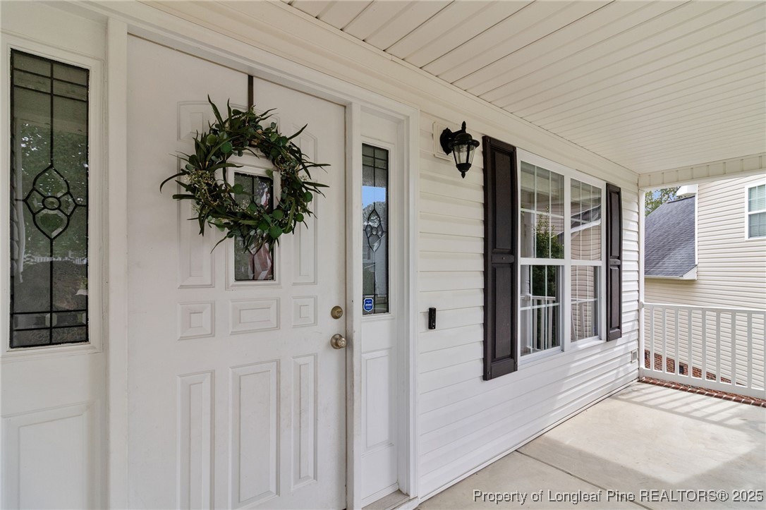 43 Ambrose Point Cameron, NC 28326 - Photo 5 of 45 a potted plant sitting in front of a door