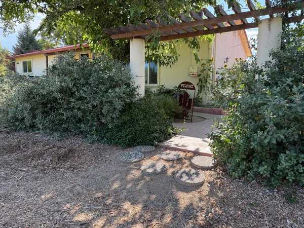 a view of a backyard with garden