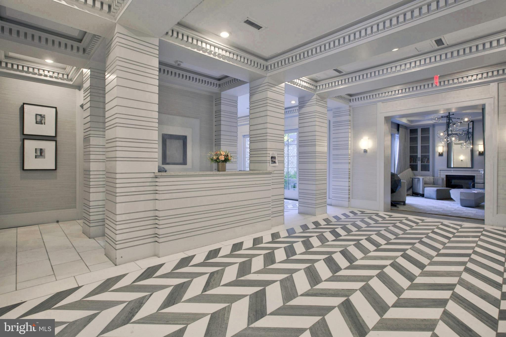 300 8th Street Northeast, Unit PH502 Washington, DC 20002 - Photo 42 of 49 Building Lobby Reception Desk Southwest