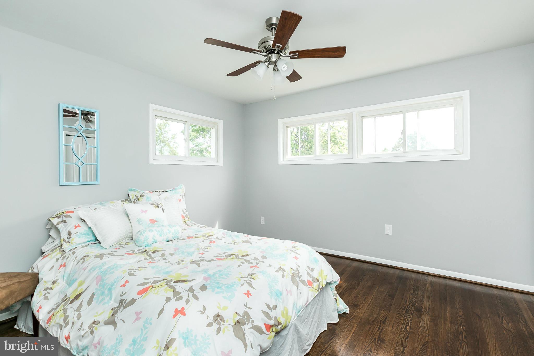 1015 Marksworth Road Catonsville, MD 21228 - Photo 6 of 13 a bedroom with a bed and a window