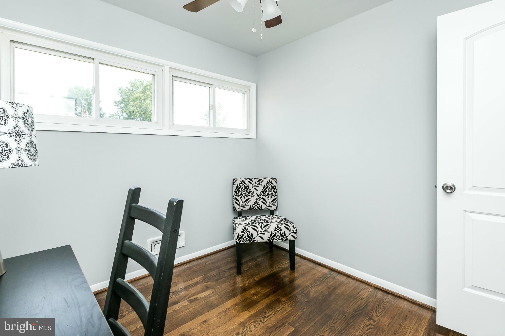 1015 Marksworth Road Catonsville, MD 21228 - Photo 10 of 13 a view of outdoor space with furniture and wooden floor