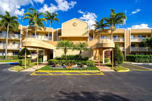 a view of a building with a street