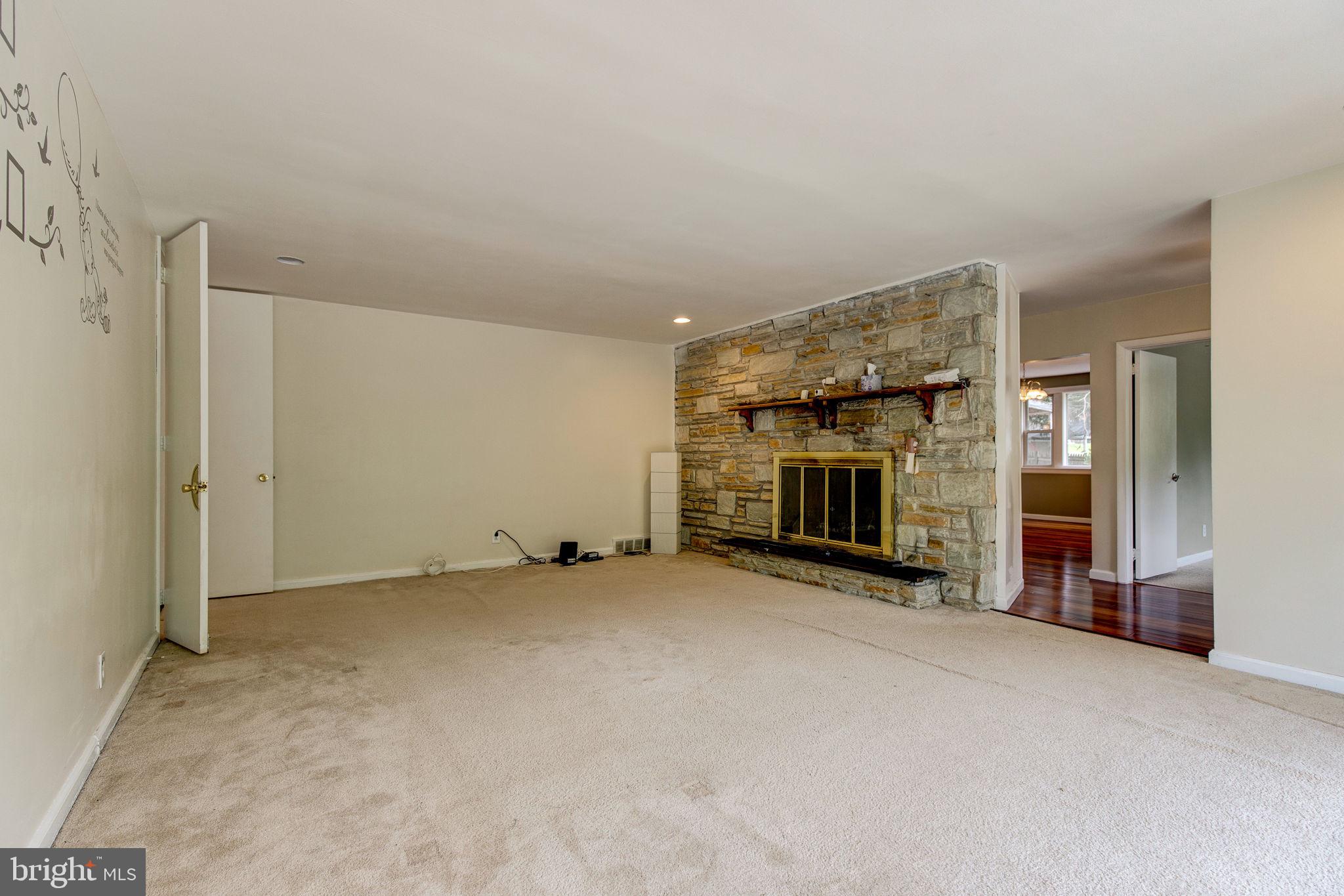 50 Parkview Road Cheltenham, PA 19012 - Photo 5 of 30 Living room with woodburning fireplace