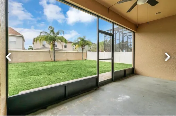 a view of a porch and garden