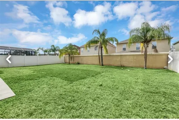 a view of an outdoor space and tennis court