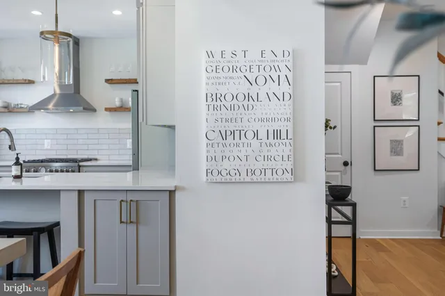 a bathroom with a sink a mirror and a shower