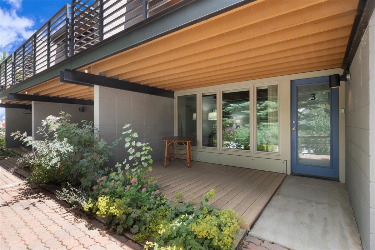 304 South High Street, Unit 3S Breckenridge, CO 80424 - Photo 16 of 20 a view of a porch with chairs and potted plants