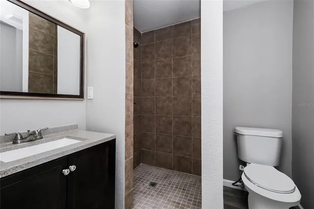 a bathroom with a sink and a toilet
