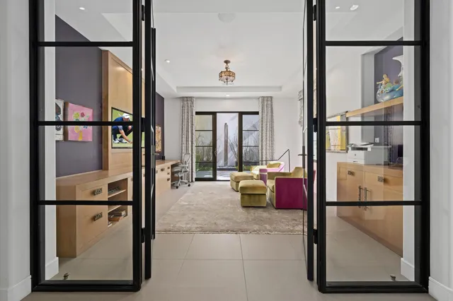 a bedroom with a bed and a fireplace