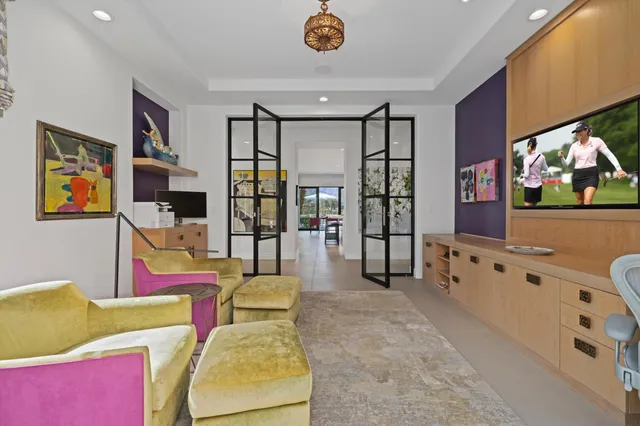 a bathroom with double vanity sink and a mirror