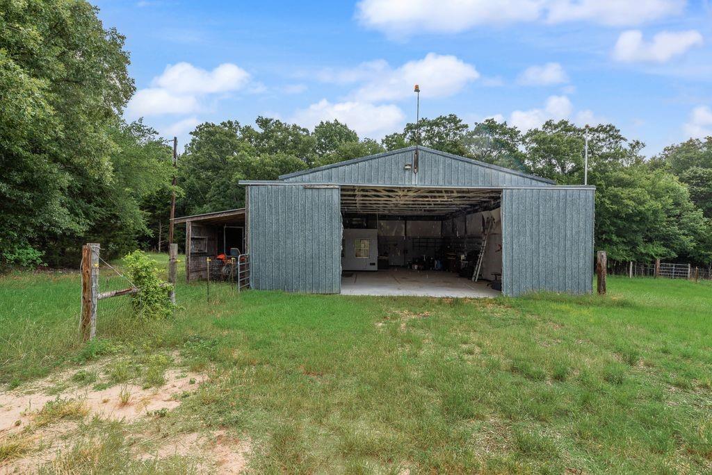9875 Old Bridge Road Terrell, TX 75160 - Photo 36 of 40 a view of a house with backyard and garden