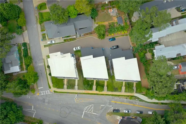 a view of a dining room with furniture and a window