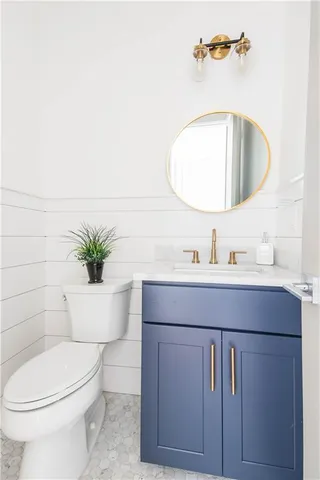 a bedroom with a large bed and a large window