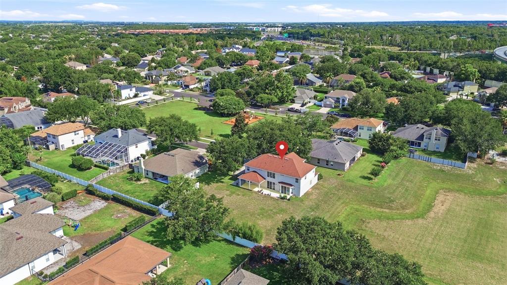 936 Kingsridge Circle Gotha, FL 34734 - Photo 30 of 50 an aerial view of residential houses with outdoor space and street view