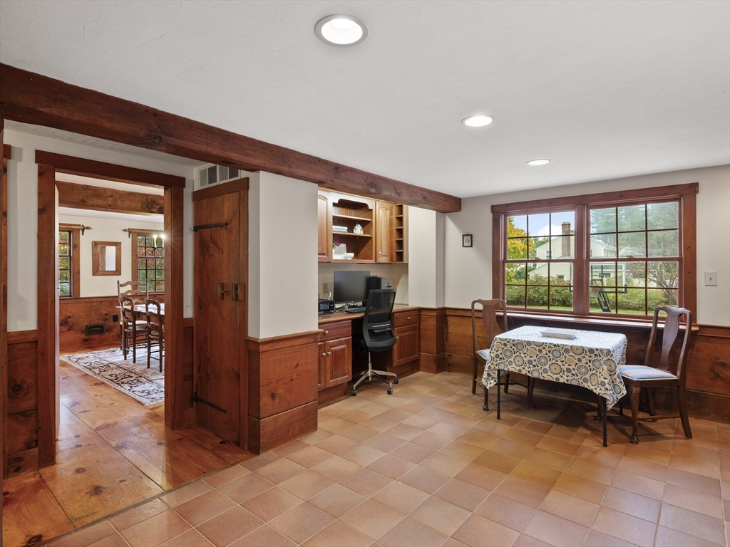 38 Mohawk Drive Acton, MA 01720 - Photo 12 of 35 a bedroom with furniture and a large window