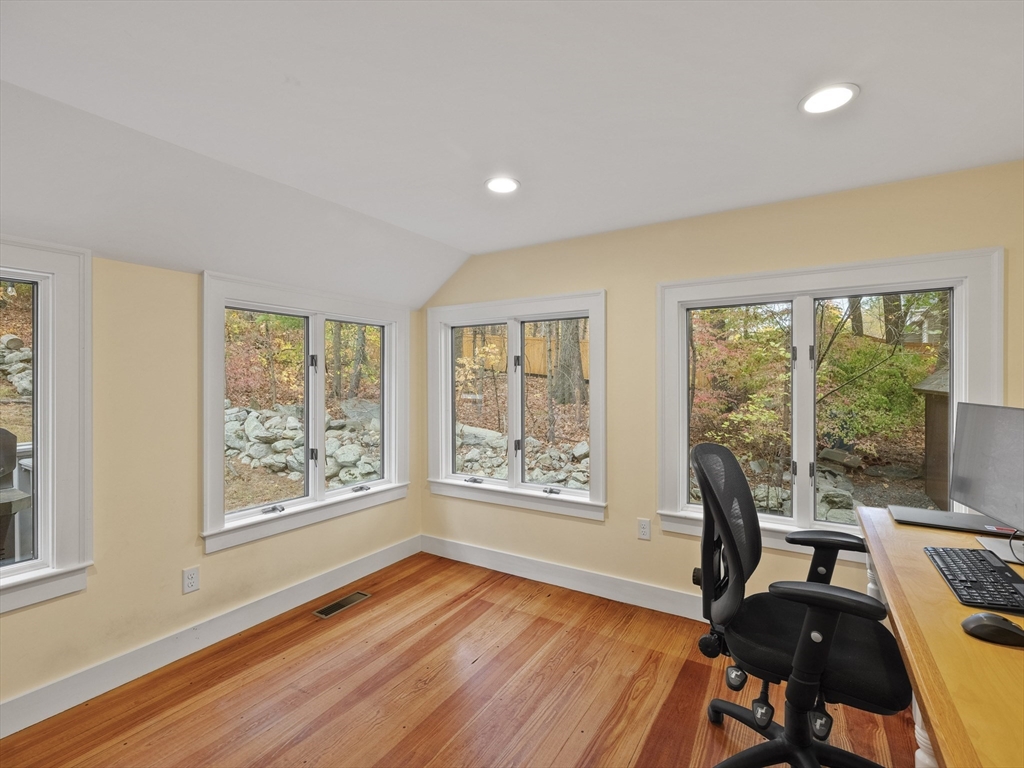 38 Mohawk Drive Acton, MA 01720 - Photo 18 of 35 a view of a room with furniture and wooden floor