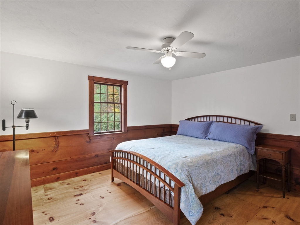 38 Mohawk Drive Acton, MA 01720 - Photo 20 of 35 a bedroom with a large bed and a window