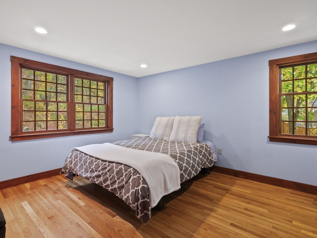 38 Mohawk Drive Acton, MA 01720 - Photo 26 of 35 a bedroom with a bed and a window